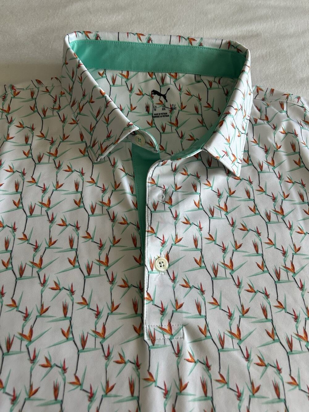 Puma Golf Polo Shirt XL Men’s All Over Bird of Paradise Print Turquoise C26